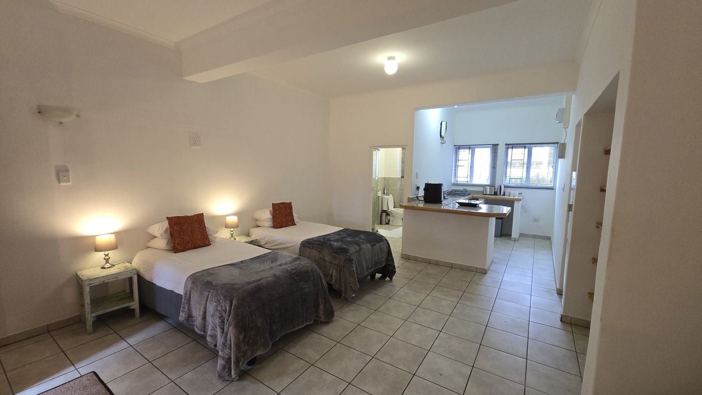 Twin beds with fresh towels